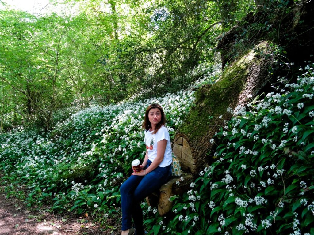 lady on woodland walk blarney castle